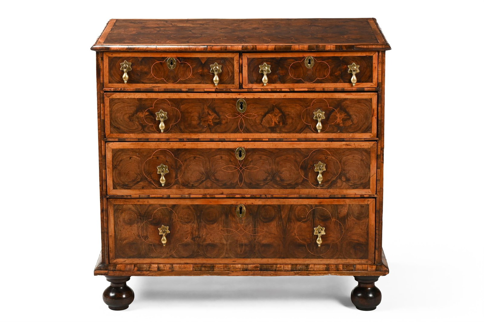 A WILLIAM & MARY OLIVEWOOD OYSTER VENEERED, LABURNUM AND WALNUT CHEST OF DRAWERS, CIRCA 1690 (1 of 4)