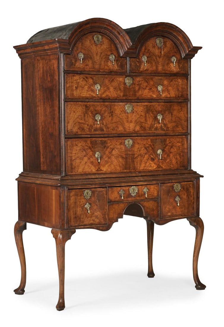 A GEORGE I WALNUT AND FEATHERBANDED DOUBLE-DOMED CHEST ON STAND, CIRCA 1715 (1 of 3)