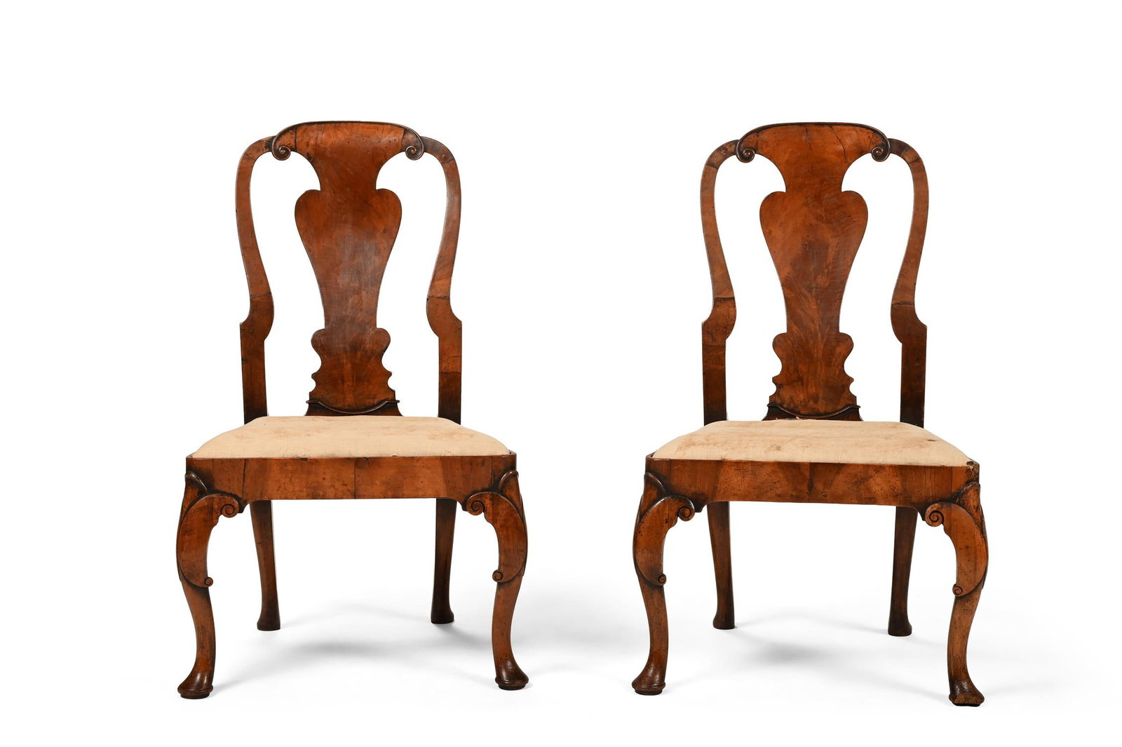 A PAIR OF GEORGE II WALNUT CHAIRS, CIRCA 1735: A PAIR OF GEORGE II WALNUT CHAIRSCIRCA 1735100.5cm high, 61cm wide, 56cm deep