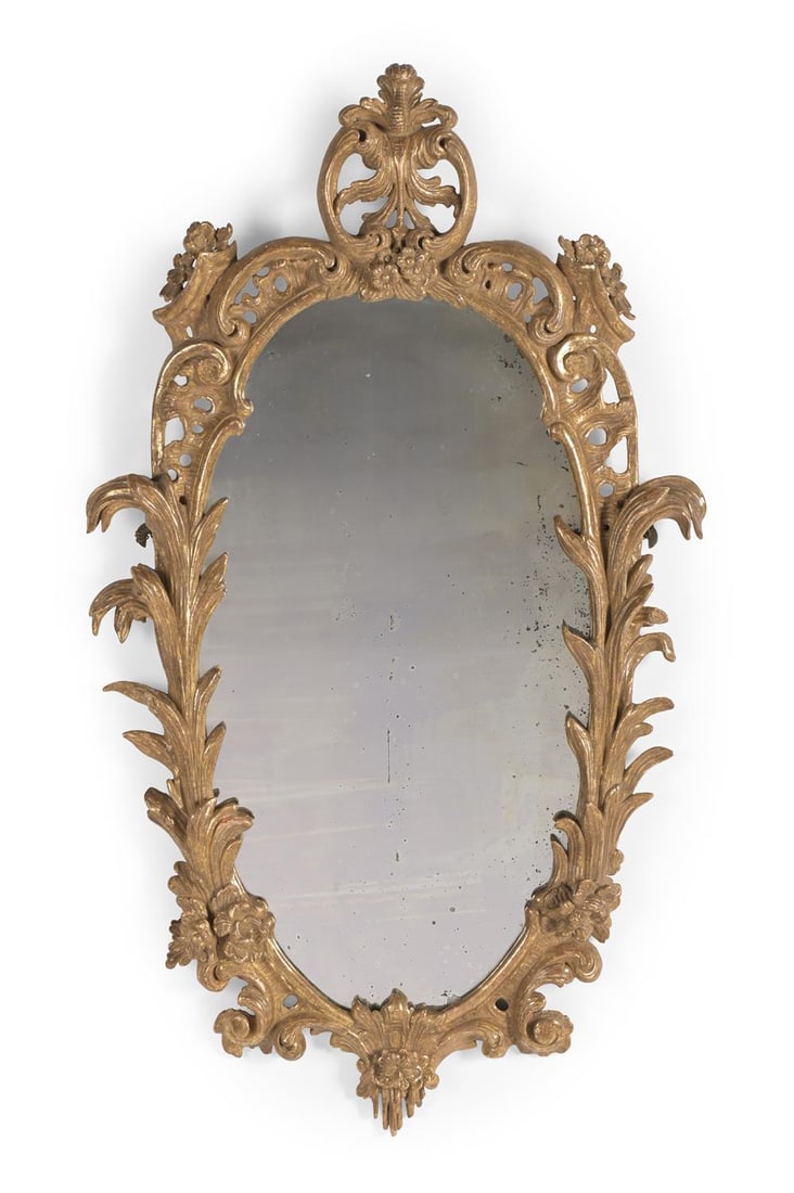 A GEORGE II CARVED GILTWOOD MIRROR, CIRCA 1755 (1 of 2)