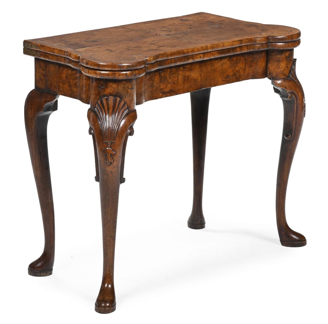 A GEORGE II WALNUT CONCERTINA ACTION CARD TABLE, CIRCA 1730 (1 of 3)