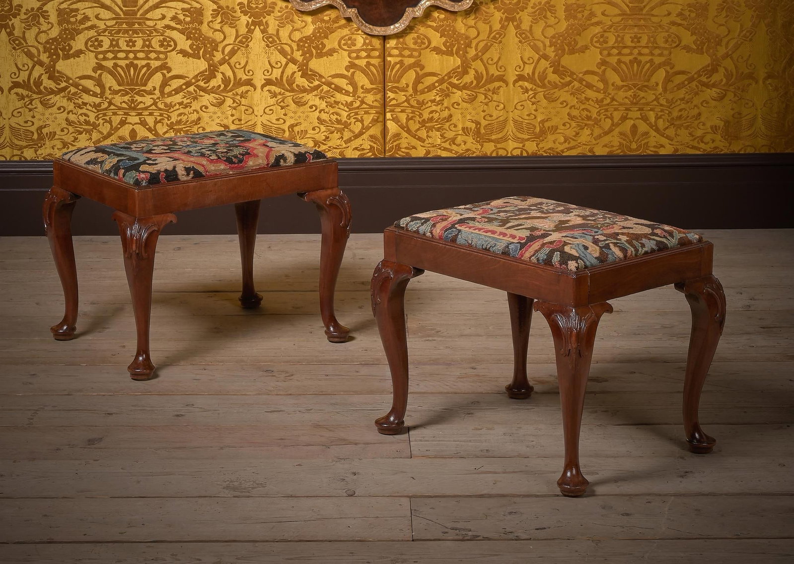 A PAIR OF GEORGE II CARVED MAHOGANY AND NEEDLEWORK UPHOLSTERED STOOLS, CIRCA 1740 (1 of 6)