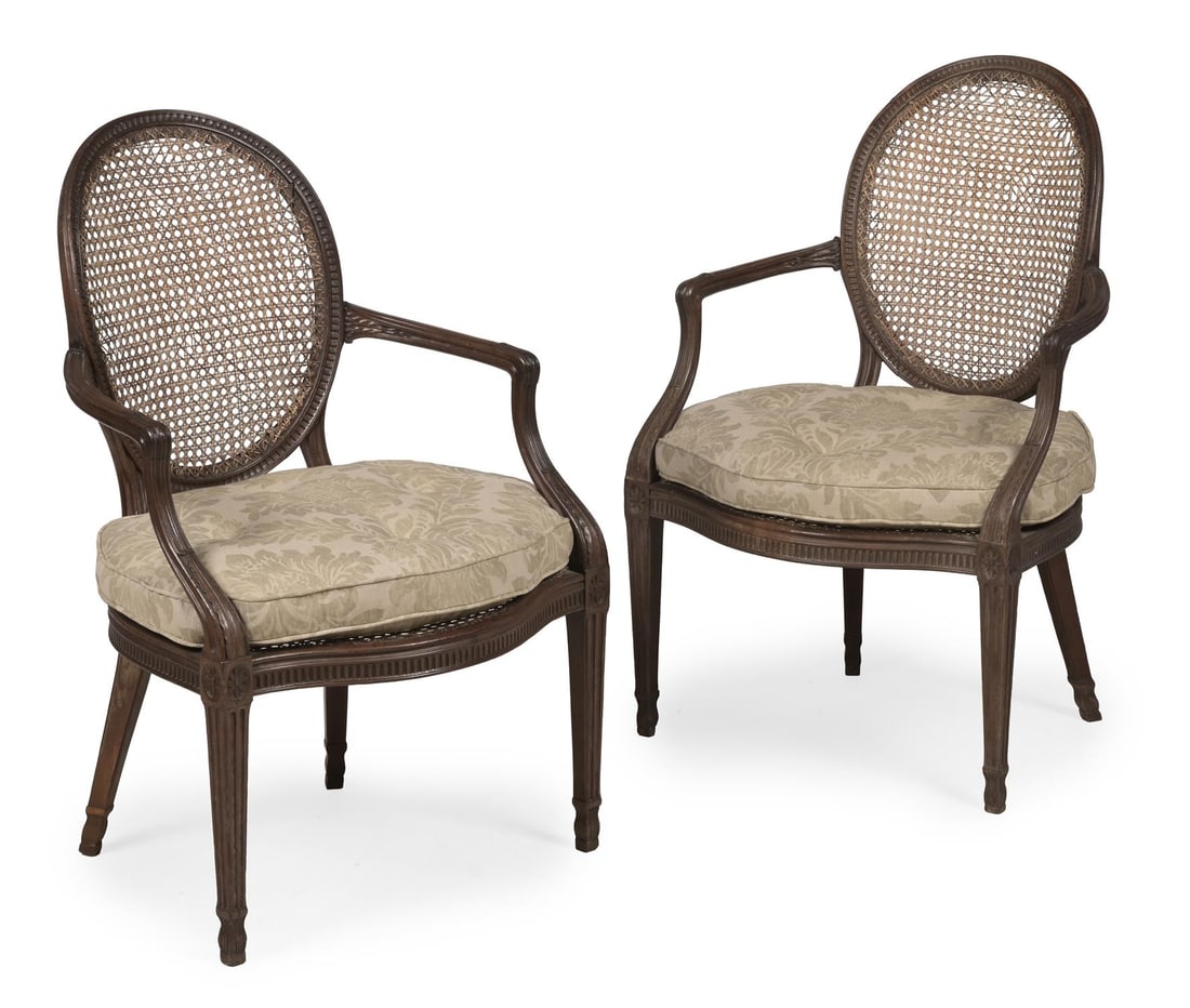 A PAIR OF GEORGE III MAHOGANY LIBRARY ARMCHAIRS, IN THE MANNER OF THOMAS CHIPPENDALE, CIRCA 1790 (1 of 6)