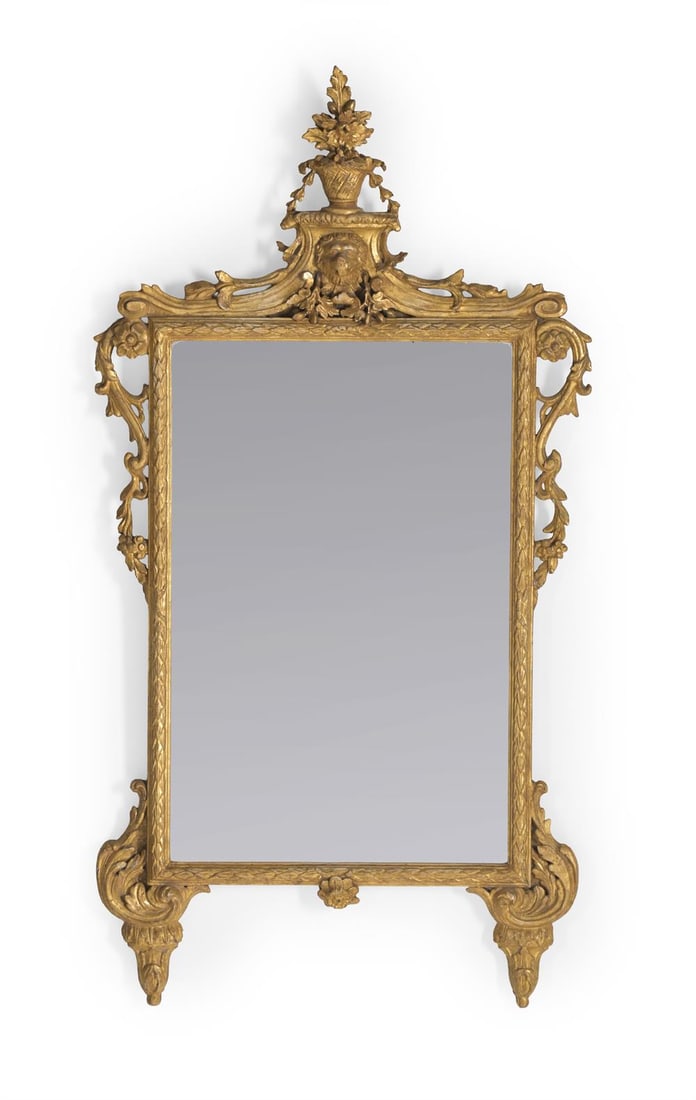 AN ITALIAN CARVED GILTWOOD MIRROR, CIRCA 1780 (1 of 2)