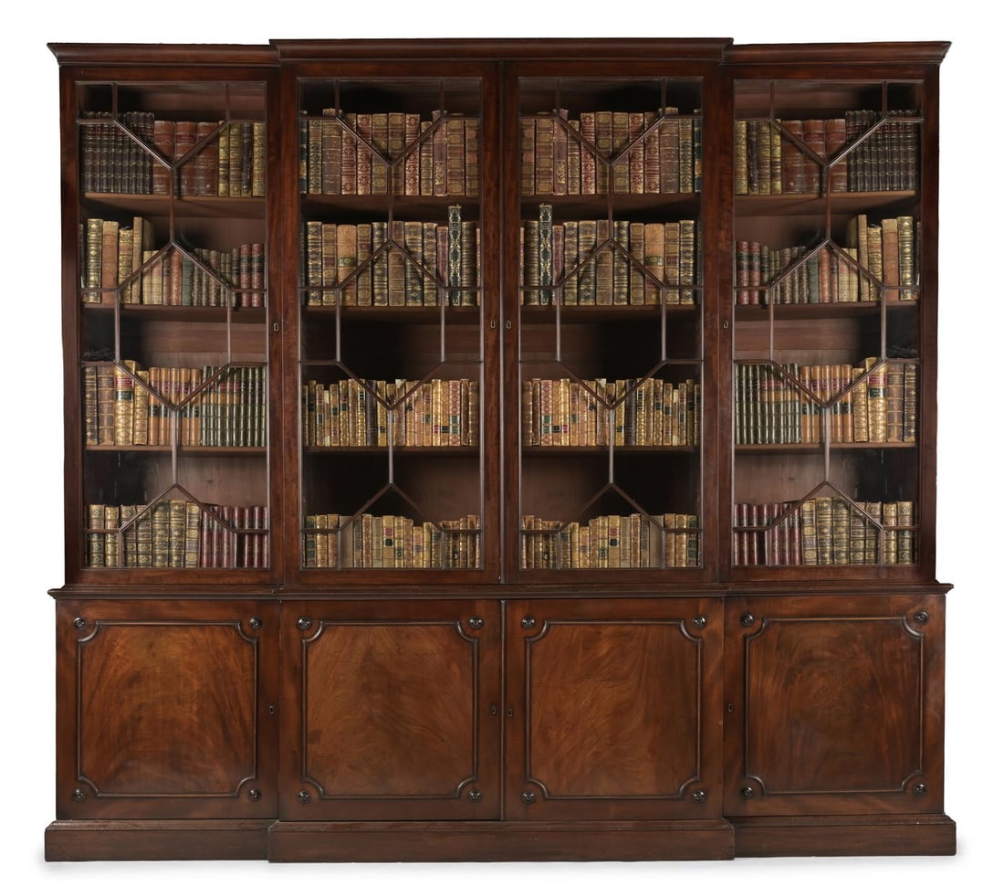 A GEORGE III MAHOGANY BREAKFRONT LIBRARY BOOKCASE, CIRCA 1800 (1 of 2)