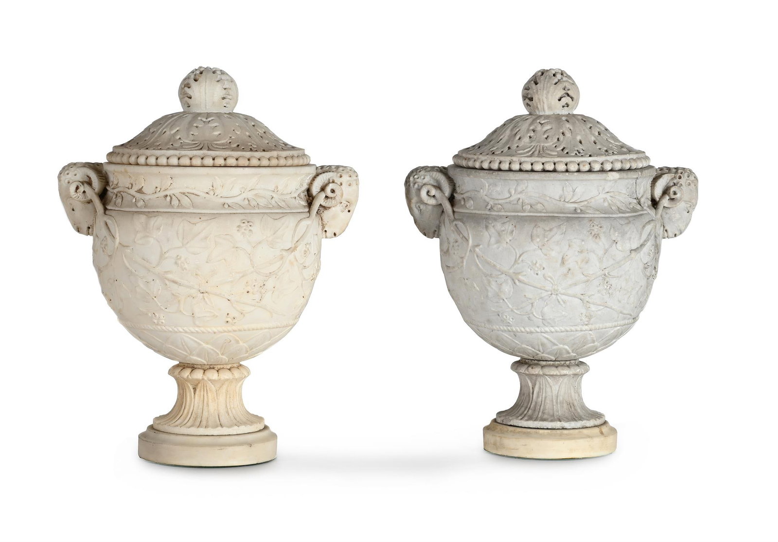 AFTER THE ANTIQUE, A MATCHED PAIR OF CARVED WHITE MARBLE 'PIRANESI' URNS (1 of 4)