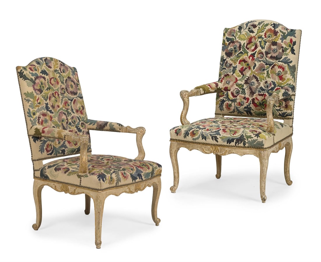 A PAIR OF LOUIS XV CREAM PAINTED, PARCEL GILT AND NEEDLEWORK UPHOLSTERED ARMCHAIRS, CIRCA 1765 (1 of 3)