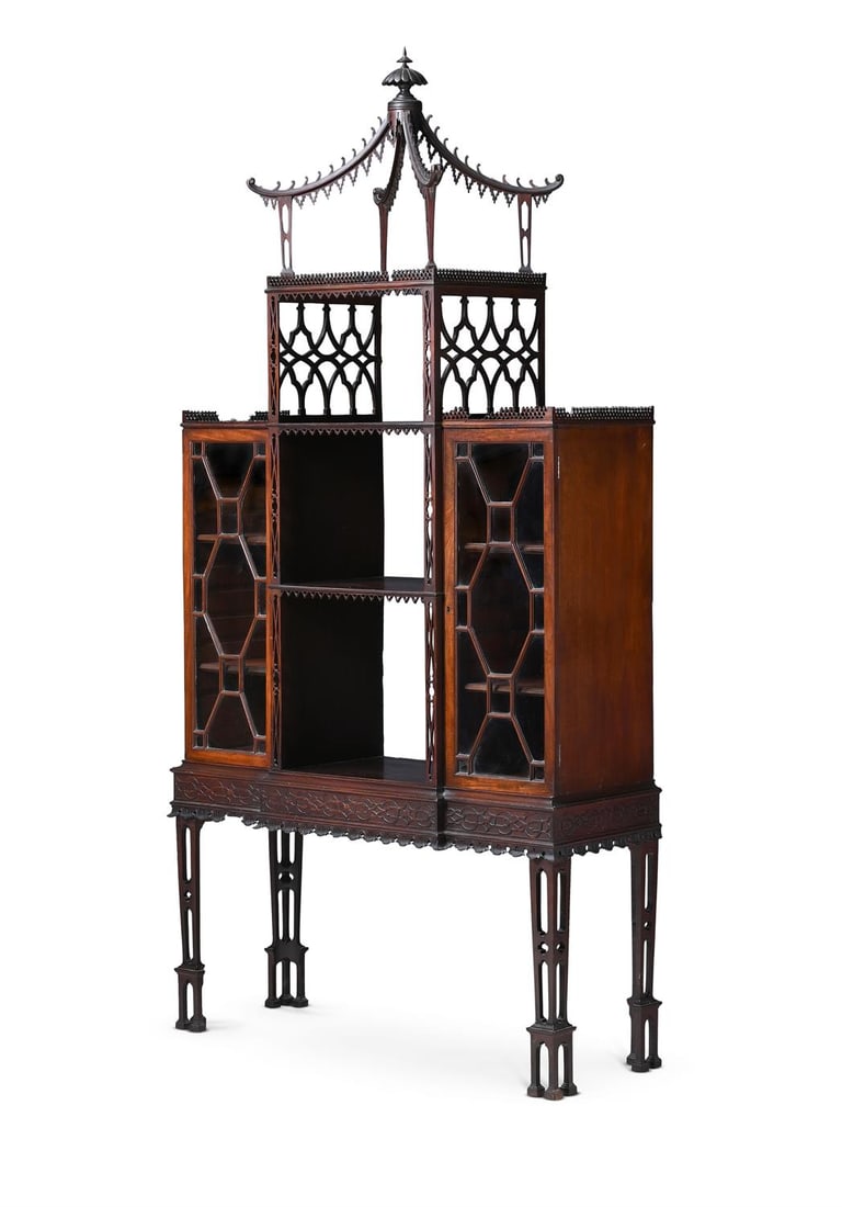 A GEORGE III MAHOGANY AND FRET CARVED DISPLAY CABINET ON STAND, CIRCA 1760: A GEORGE III MAHOGANY AND FRET CARVED DISPLAY CABINET ON STANDIN THE MANNER OF THOMAS CHIPPENDALE, CIRCA 1760222cm high, 112.5cm wide, 45cm deepProvenance: From the estate of Virginia Fortune Ryan Ogi