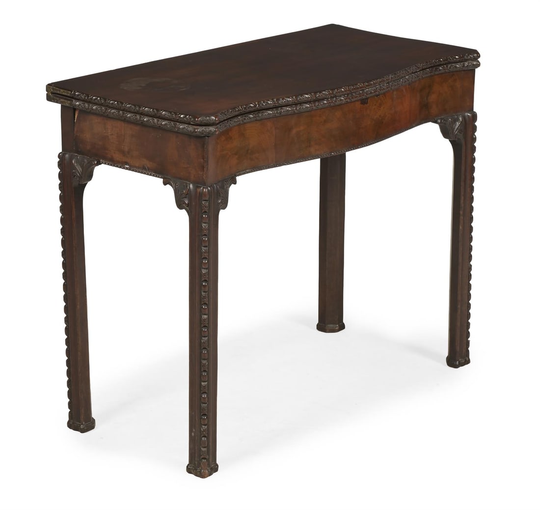 A GEORGE III CARVED MAHOGANY CONCERTINA ACTION CARD TABLE, CIRCA 1760 (1 of 4)