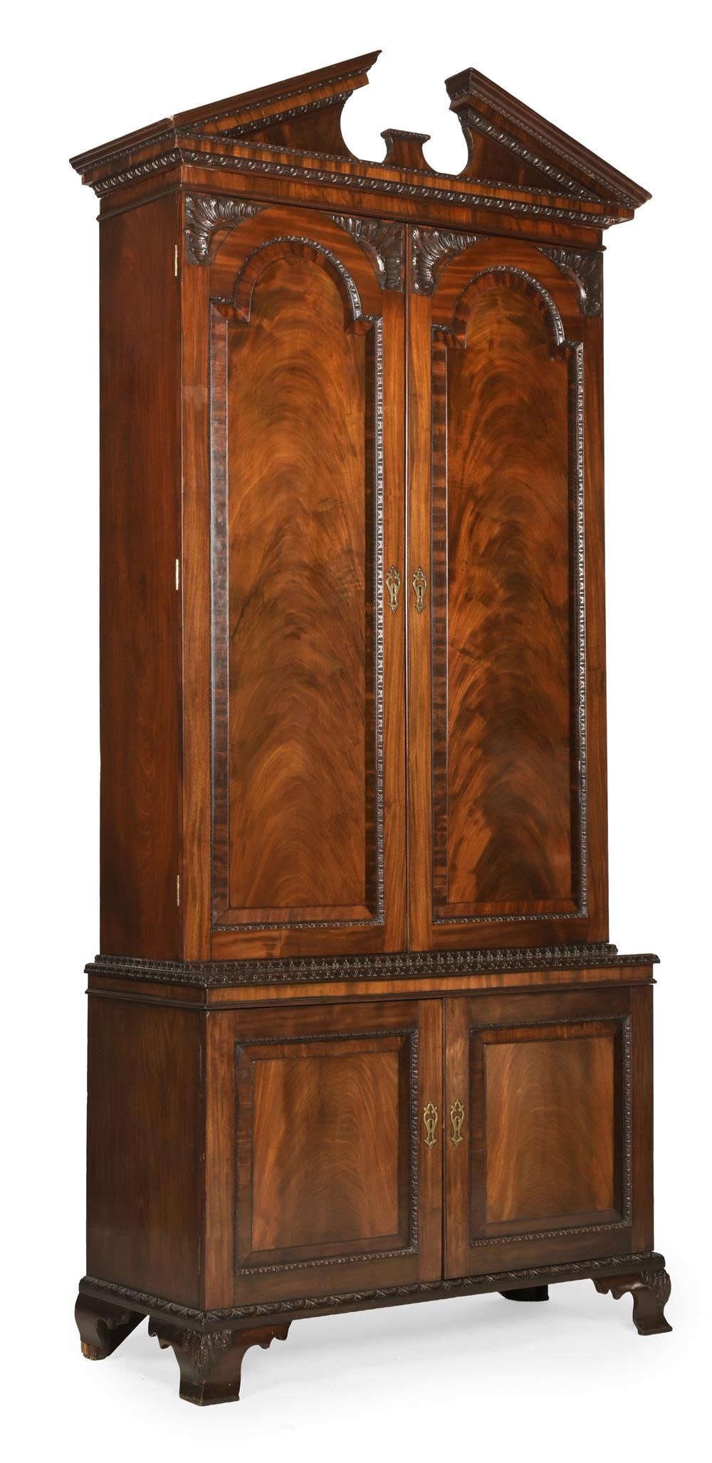 A GEORGE III CARVED MAHOGANY CABINET BOOKCASE, IN THE MANNER OF WILLIAM HALLETT, CIRCA 1770 (1 of 3)