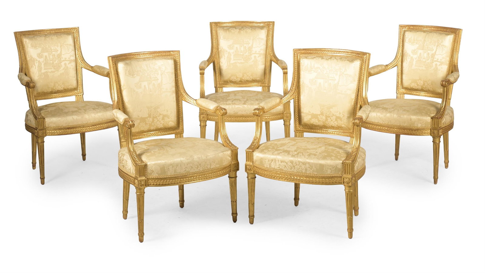 A SET OF FIVE LOUIS XVI CARVED GILT WALNUT ARMCHAIRS, BY HENRI JACOB, CIRCA 1780 (1 of 4)