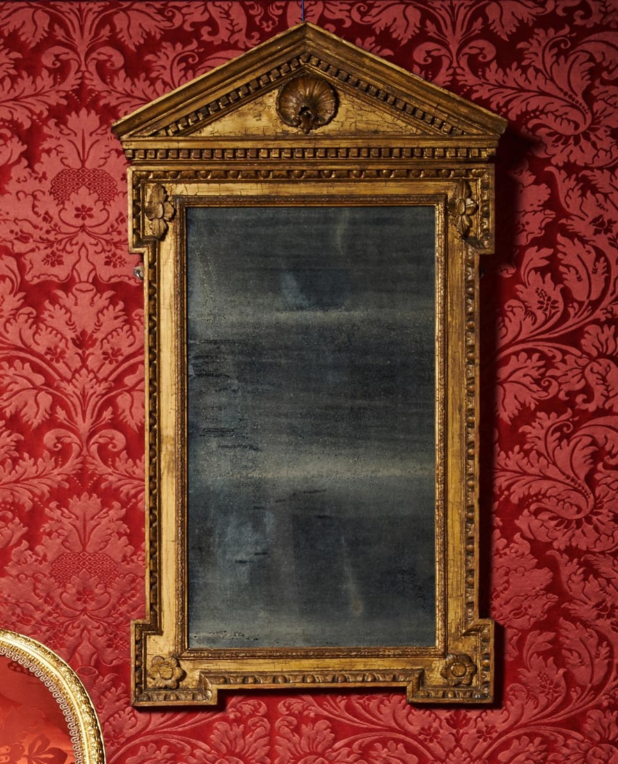 A GEORGE III CARVED GILTWOOD AND GESSO ARCHITECTURAL MIRROR, CIRCA 1760 (1 of 3)