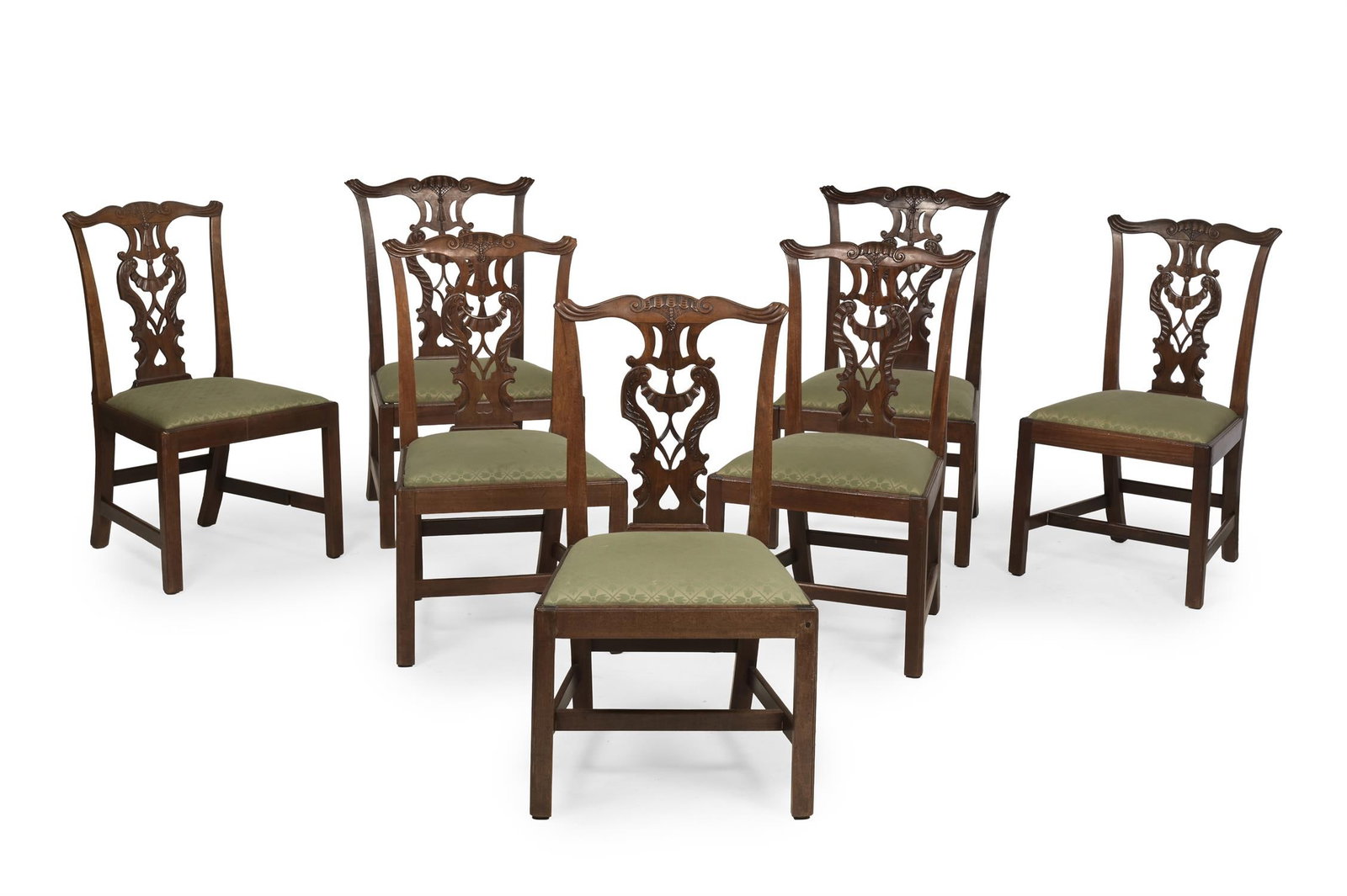 A SET OF SEVEN GEORGE III MAHOGANY DINING CHAIRS, PROBABLY IRISH, CIRCA 1770 (1 of 4)