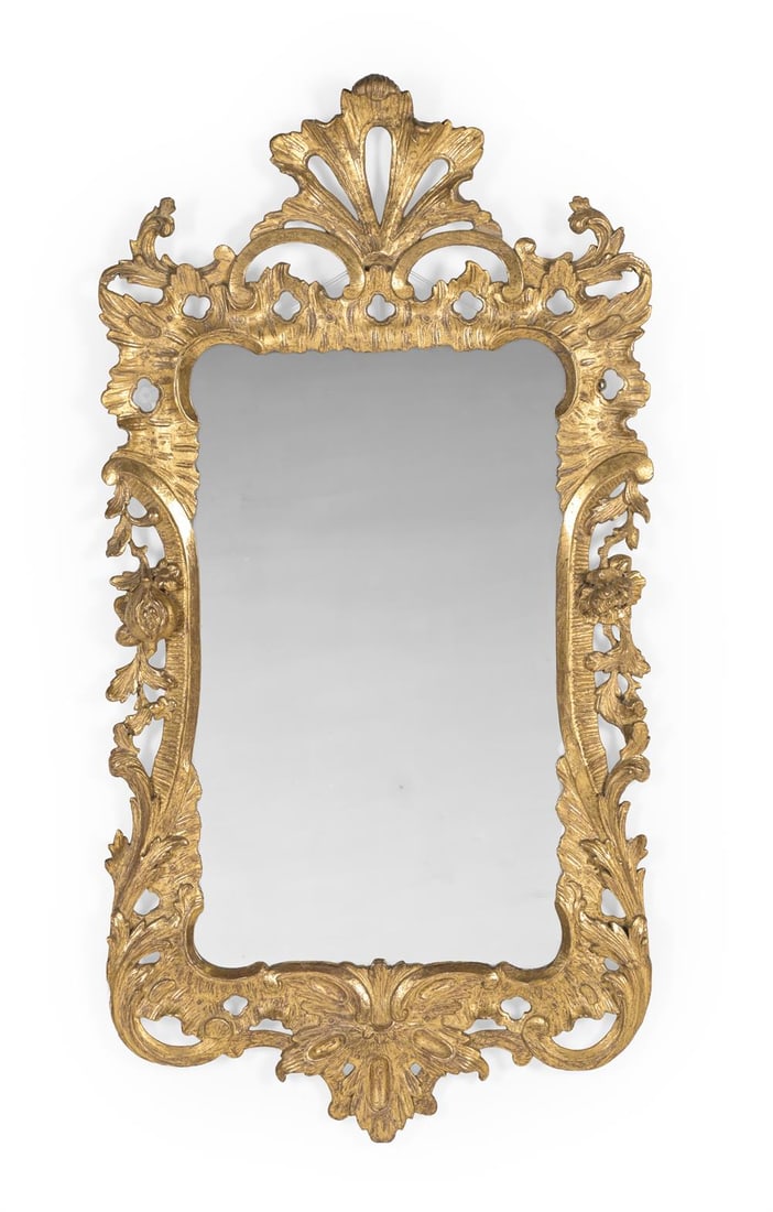 A GEORGE III CARVED GILTWOOD MIRROR, CIRCA 1760 (1 of 2)
