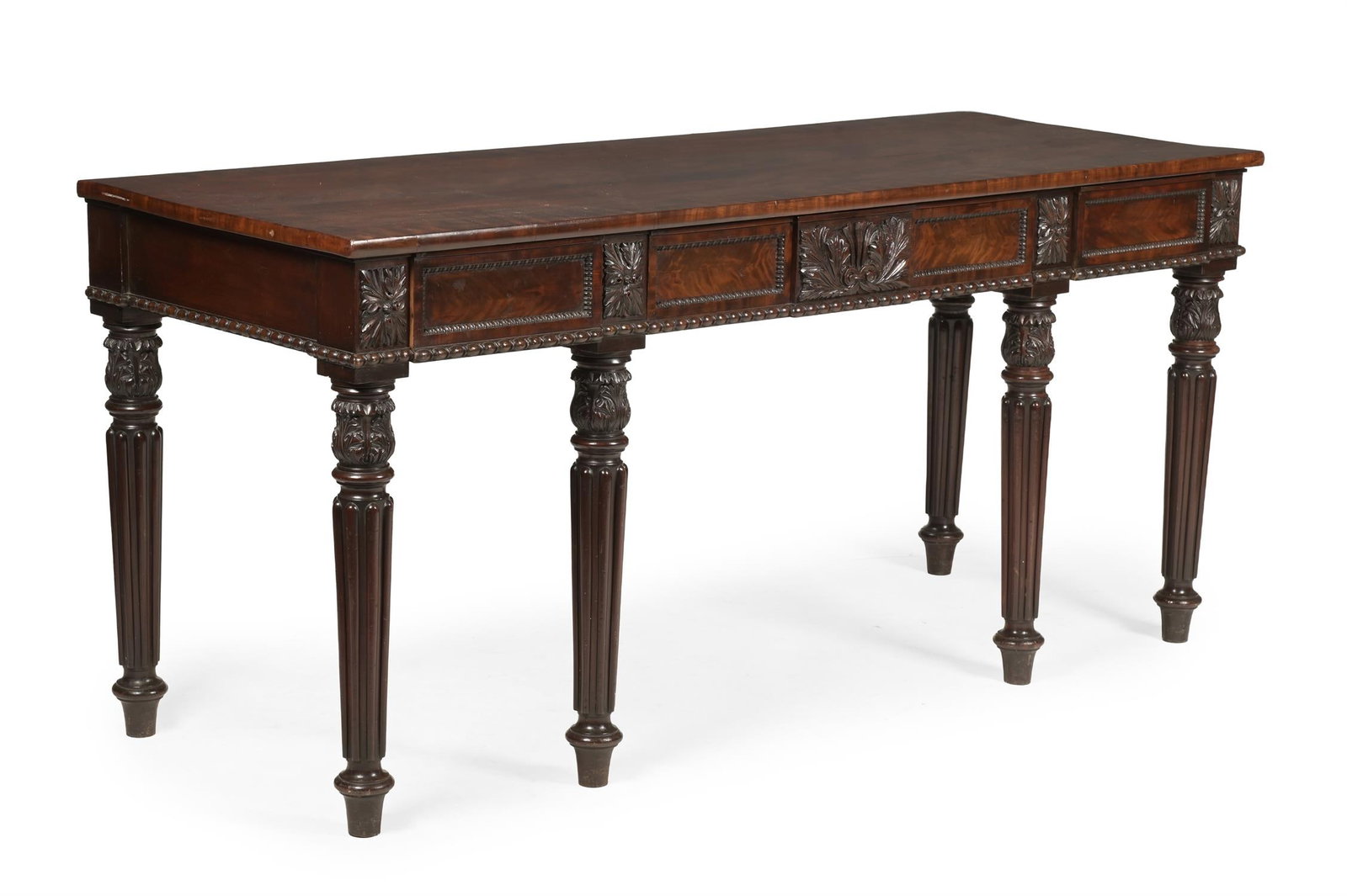 A REGENCY CARVED MAHOGANY SERVING OR HALL TABLE, IN THE MANNER OF GILLOWS, CIRCA 1820 (1 of 3)