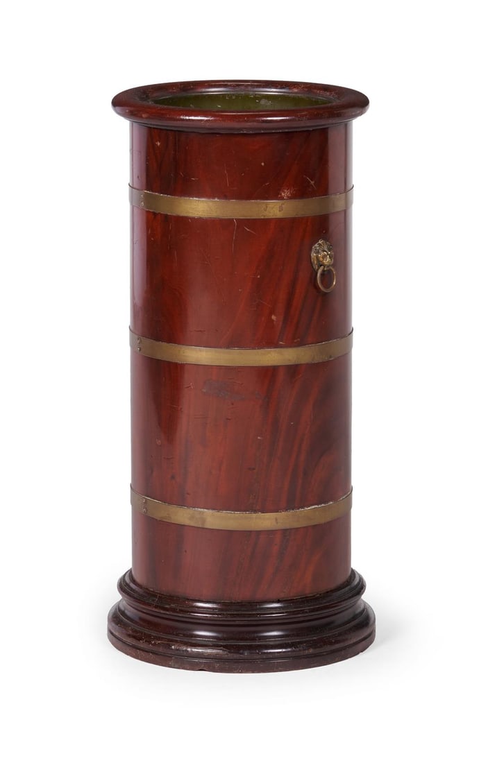 A WILLIAM IV MAHOGANY AND BRASS BOUND CYLINDRICAL STICK STAND, CIRCA 1835 (1 of 2)