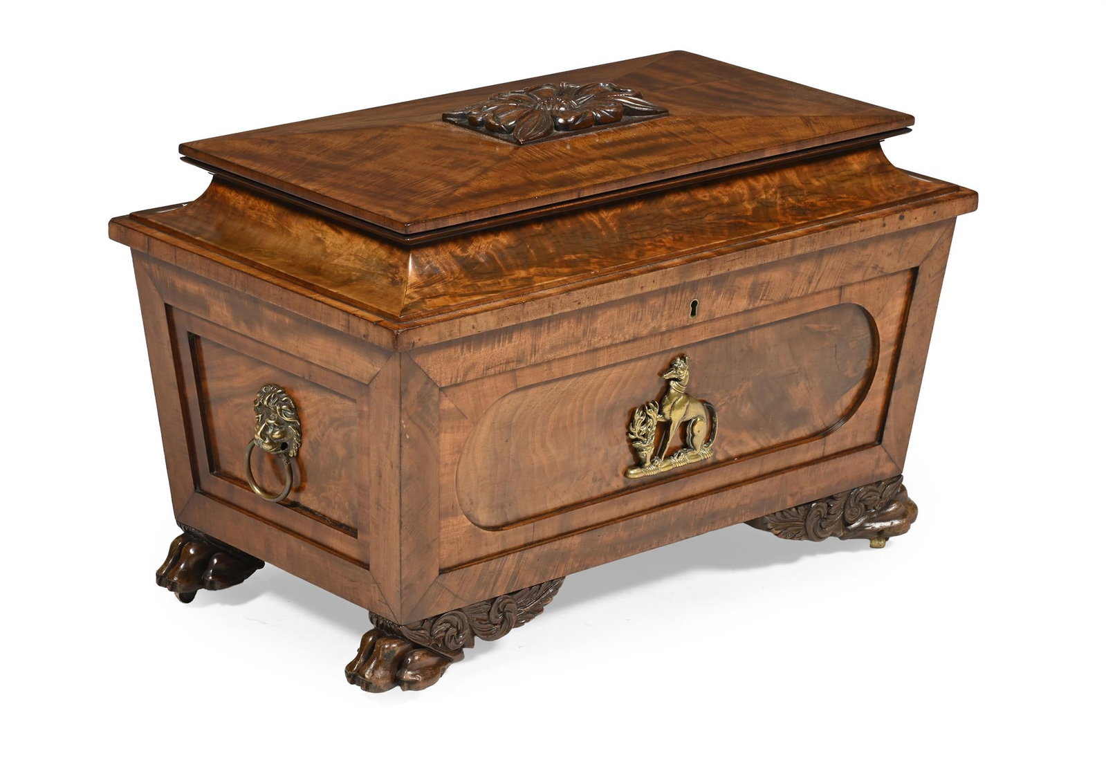 A FINE REGENCY MAHOGANY AND GILT BRASS MOUNTED SARCOPHAGUS WINE COOLER, CIRCA 1815: A FINE REGENCY MAHOGANY AND GILT BRASS MOUNTED SARCOPHAGUS WINE COOLERIN THE MANNER OF GILLOWS, CIRCA 1815With a gilt brass armorial possibly for the Baron Leigh family51cm high, 76cm wide, 44cm deep