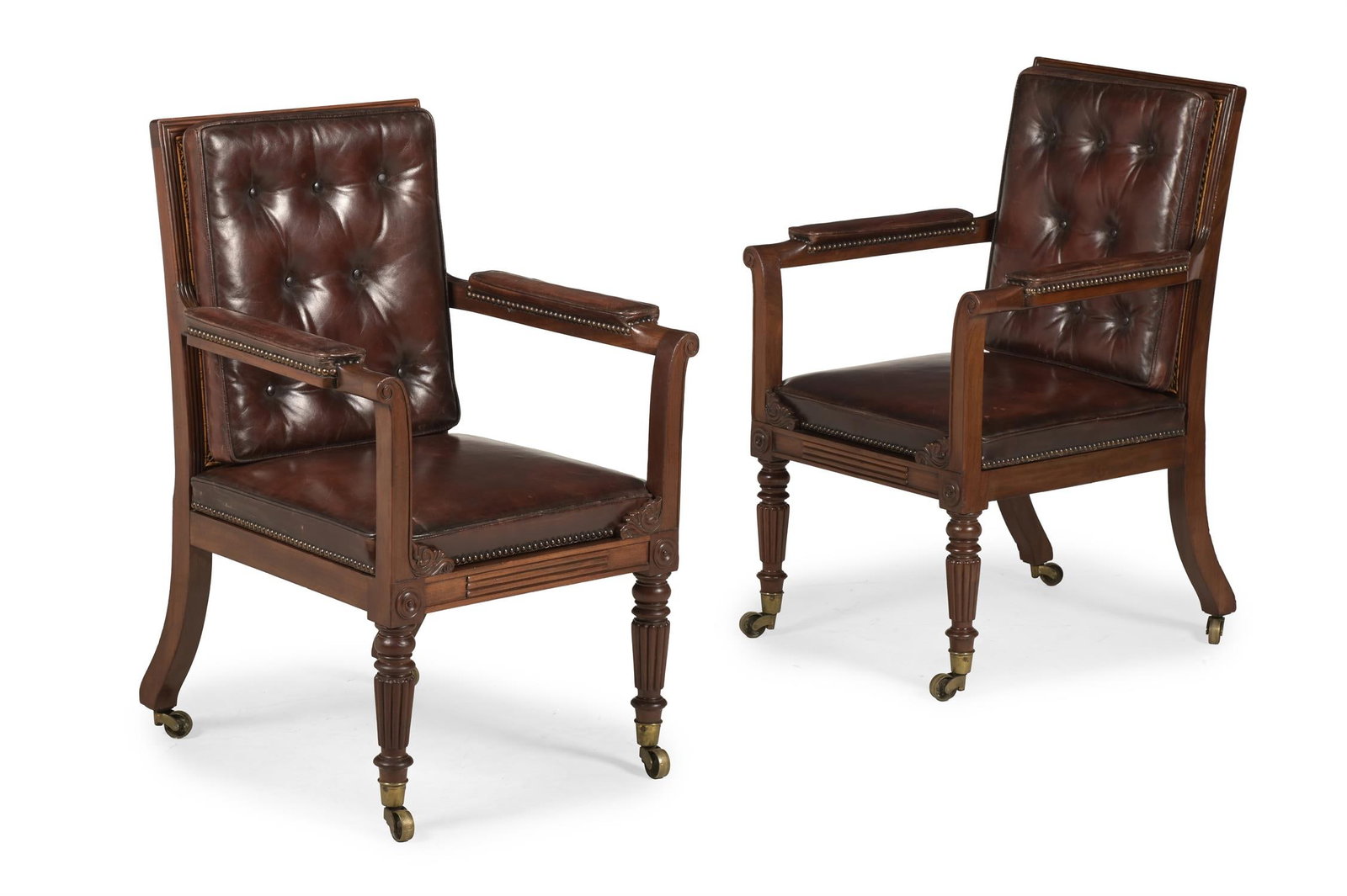 A PAIR OF REGENCY MAHOGANY LIBRARY BERGERE ARMCHAIRS, ATTRIBUTED TO GILLOWS, CIRCA 1815 (1 of 3)