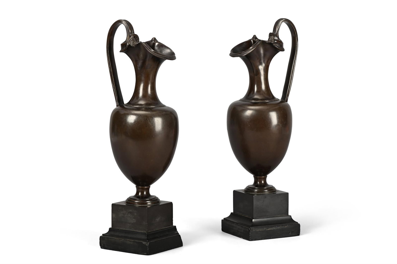 A PAIR OF REGENCY BRONZE EWERS ON MARBLE BASES, EARLY 19TH CENTURY (1 of 4)