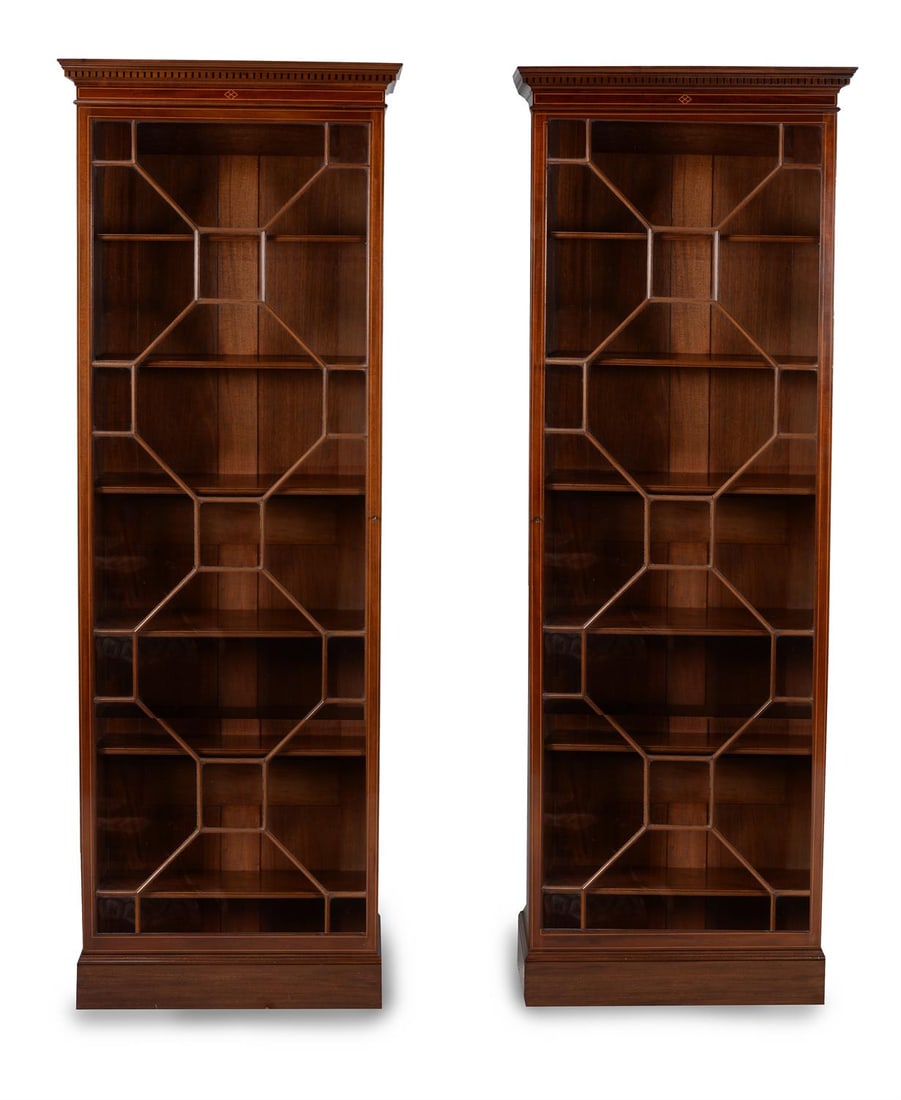 A PAIR OF MAHOGANY BOOKCASES, BY HOWARD & SONS, IN GEORGE III STYLE, CIRCA 1890: A PAIR OF MAHOGANY BOOKCASES BY HOWARD & SONS, IN GEORGE III STYLE, CIRCA 1890 Each bearing a plaque to the reverse 'HOWARD & SONS LTD 25, 26 27 BERNERS ST, LONDON W.', both also stamped by the maker,