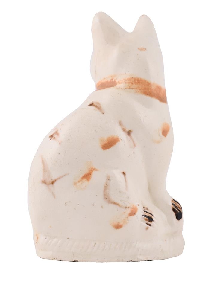 A STAFFORDSHIRE CREAMWARE MODEL OF A SEATED CAT, CIRCA 1780 - 2