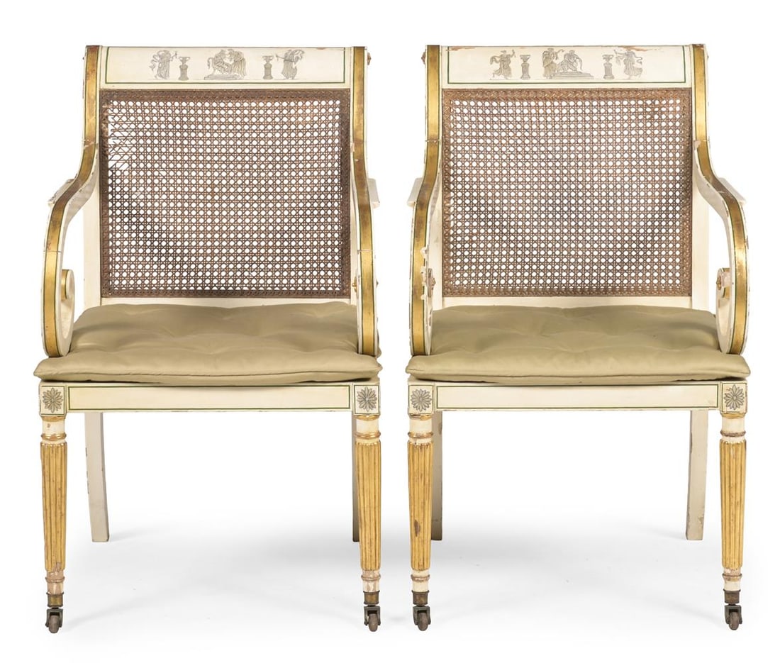 A PAIR OF PAINTED AND PARCEL GILT OPEN ARMCHAIRS, IN THE REGENCY STYLE, CIRCA 1900 - 2
