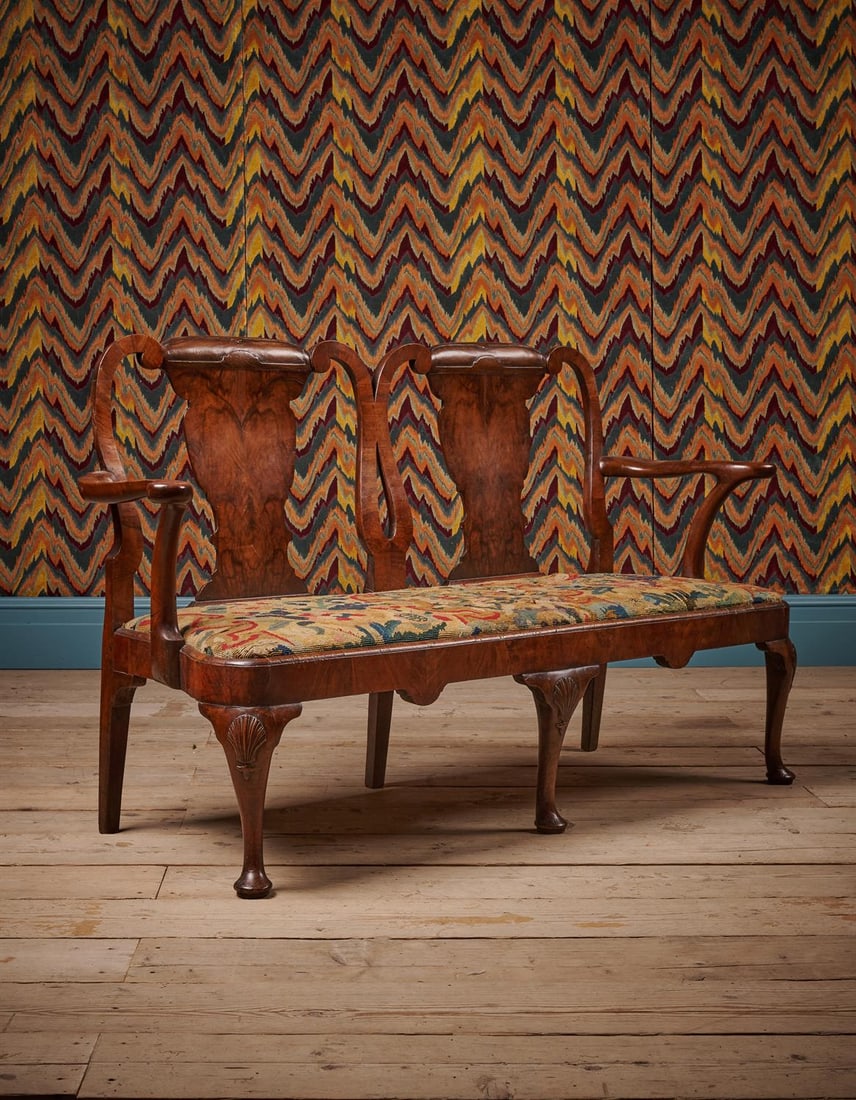 A GEORGE II WALNUT SETTEE, CIRCA 1735 (1 of 4)
