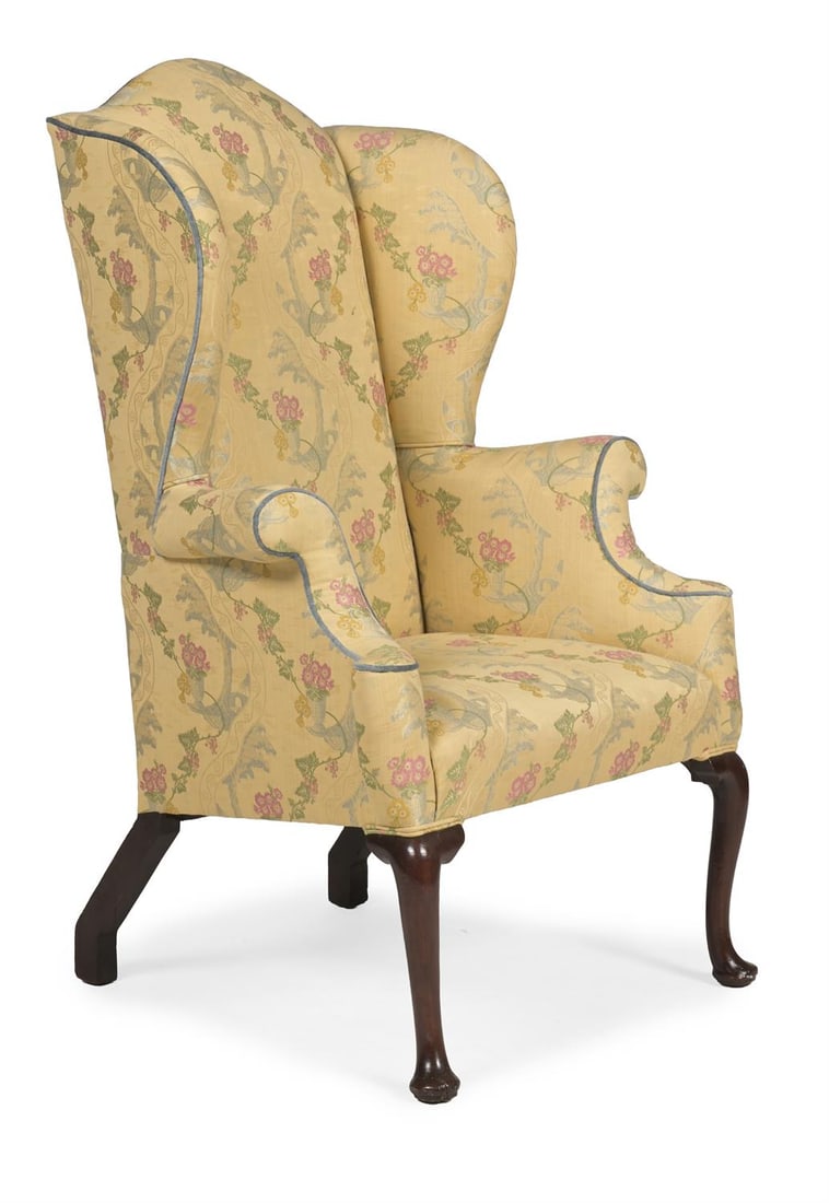 A GEORGE II MAHOGANY AND UPHOLSTERED WING ARMCHAIR, CIRCA 1740 (1 of 3)