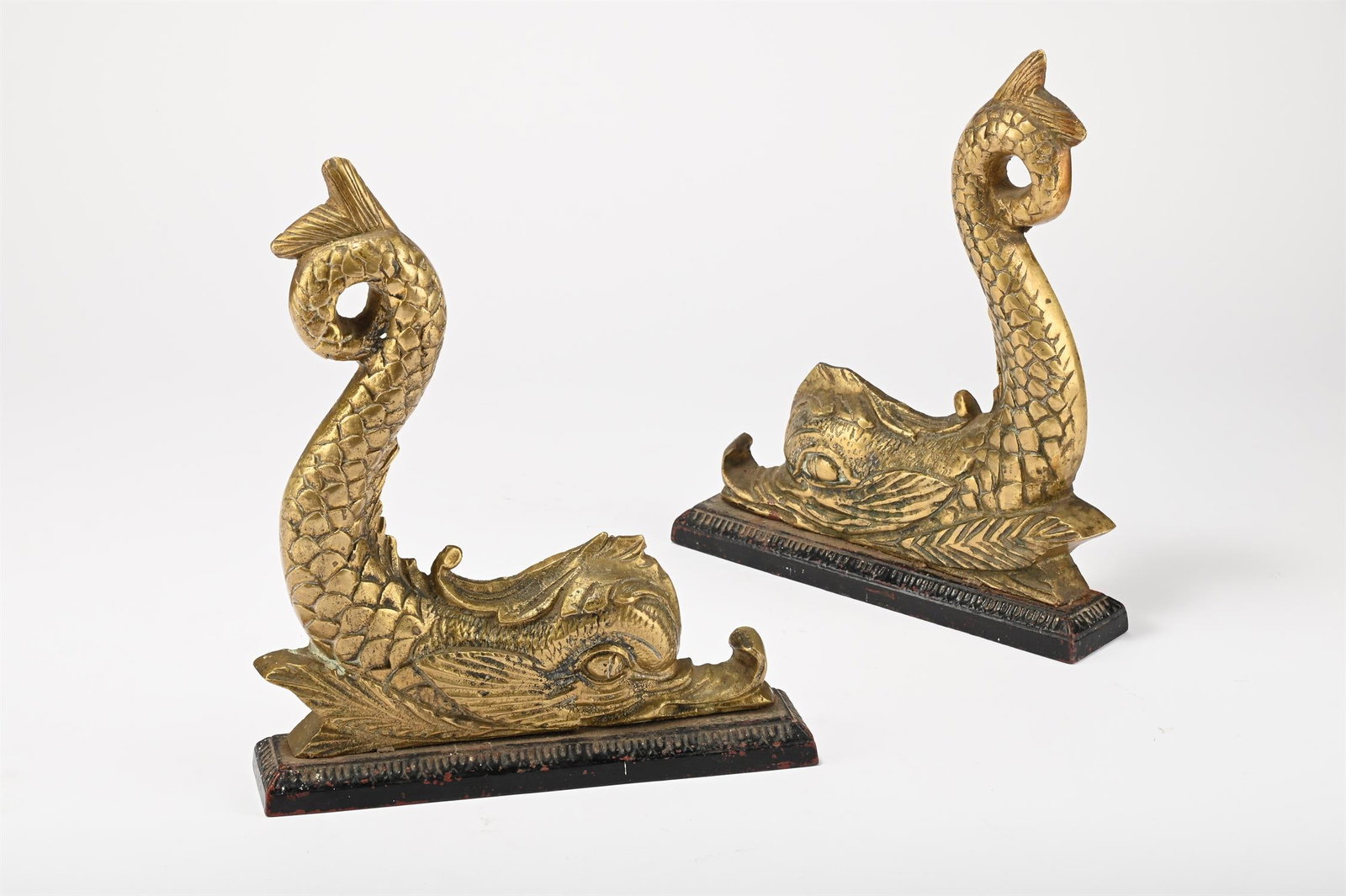 A PAIR OF VICTORIAN BRASS AND CAST IRON DOLPHIN DOOR STOPS OR DOOR PORTERS, MID 19TH CENTURY (1 of 3)