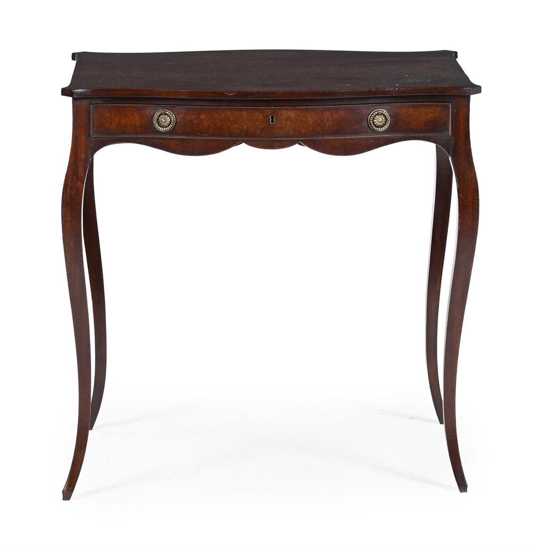 A GEORGE III MAHOGANY SERPENTINE CENTRE OR WRITING TABLE, IN THE MANNER OF JOHN COBB, CIRCA 1765 (1 of 3)