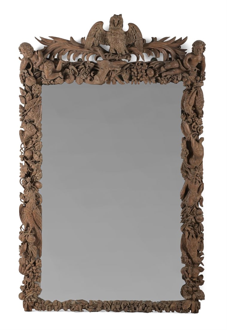 A LARGE BLACK FOREST CARVED OAK MIRROR, 19TH CENTURY (1 of 2)