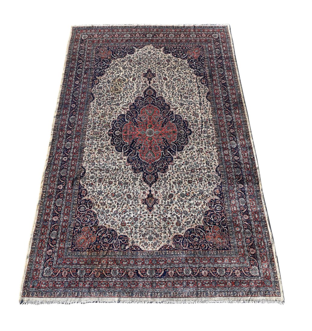 † AN AMRITSAR CARPET, OF KIRMAN DESIGN, CIRCA 1900 (1 of 4)
