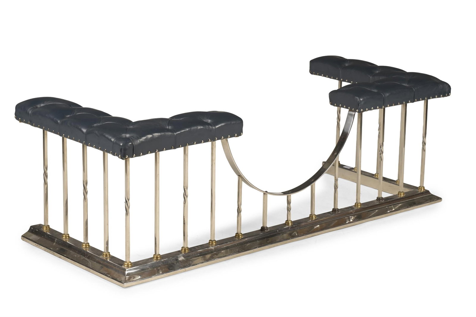 A POLISHED STEEL, BRASS AND BUTTONED LEATHER UPHOLSTERED CLUB FENDER, 20TH CENTURY: A POLISHED STEEL, BRASS AND BUTTONED LEATHER UPHOLSTERED CLUB FENDER 20TH CENTURY 54cm highthe seat externally 174.5cm wide, 71cm deep, internally 137cm wide, 41cm deep the base externally 169.5cm wid