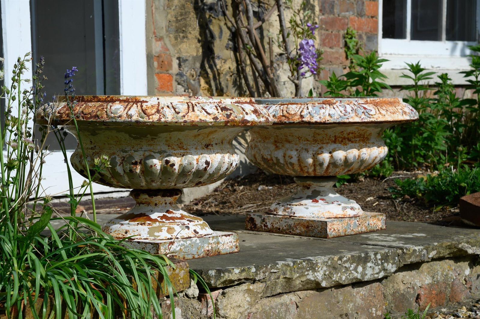 A PAIR OF LATE VICTORIAN CAST IRON PLANTERS, LATE 19TH CENTURY (1 of 3)