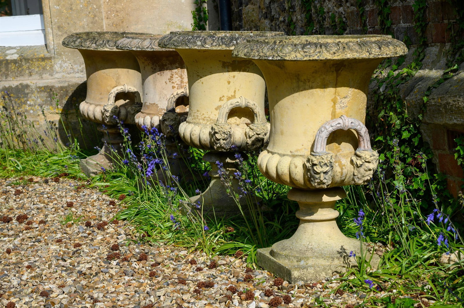 A SET OF FOUR TERRACOTTA COLOURED COMPOSITION STONE CAMPANA URN PLANTERS, 20TH CENTURY (1 of 1)