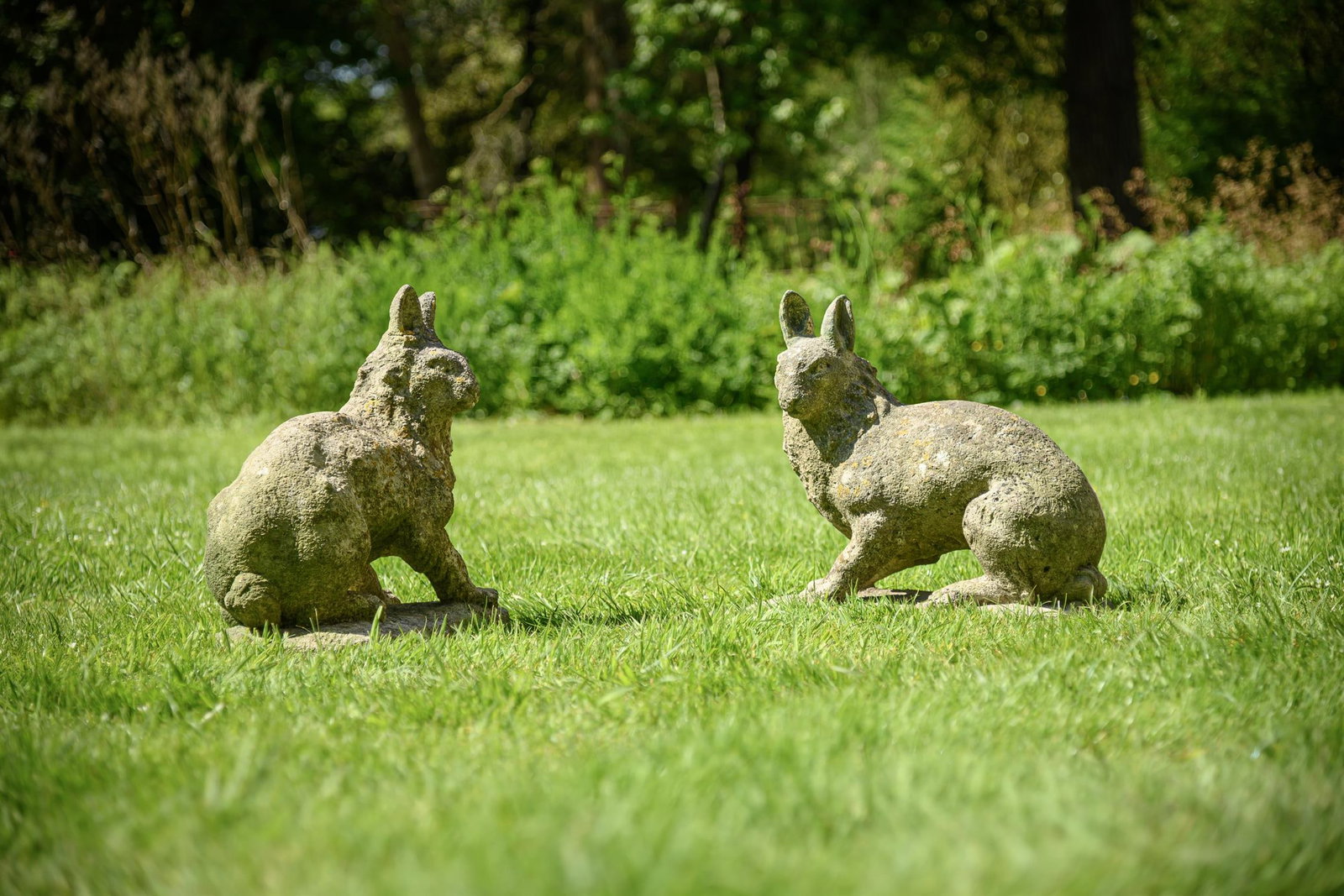 AN UNUSUAL PAIR OF CARVED COTSWOLD STONE HARES, 19TH CENTURY (1 of 2)