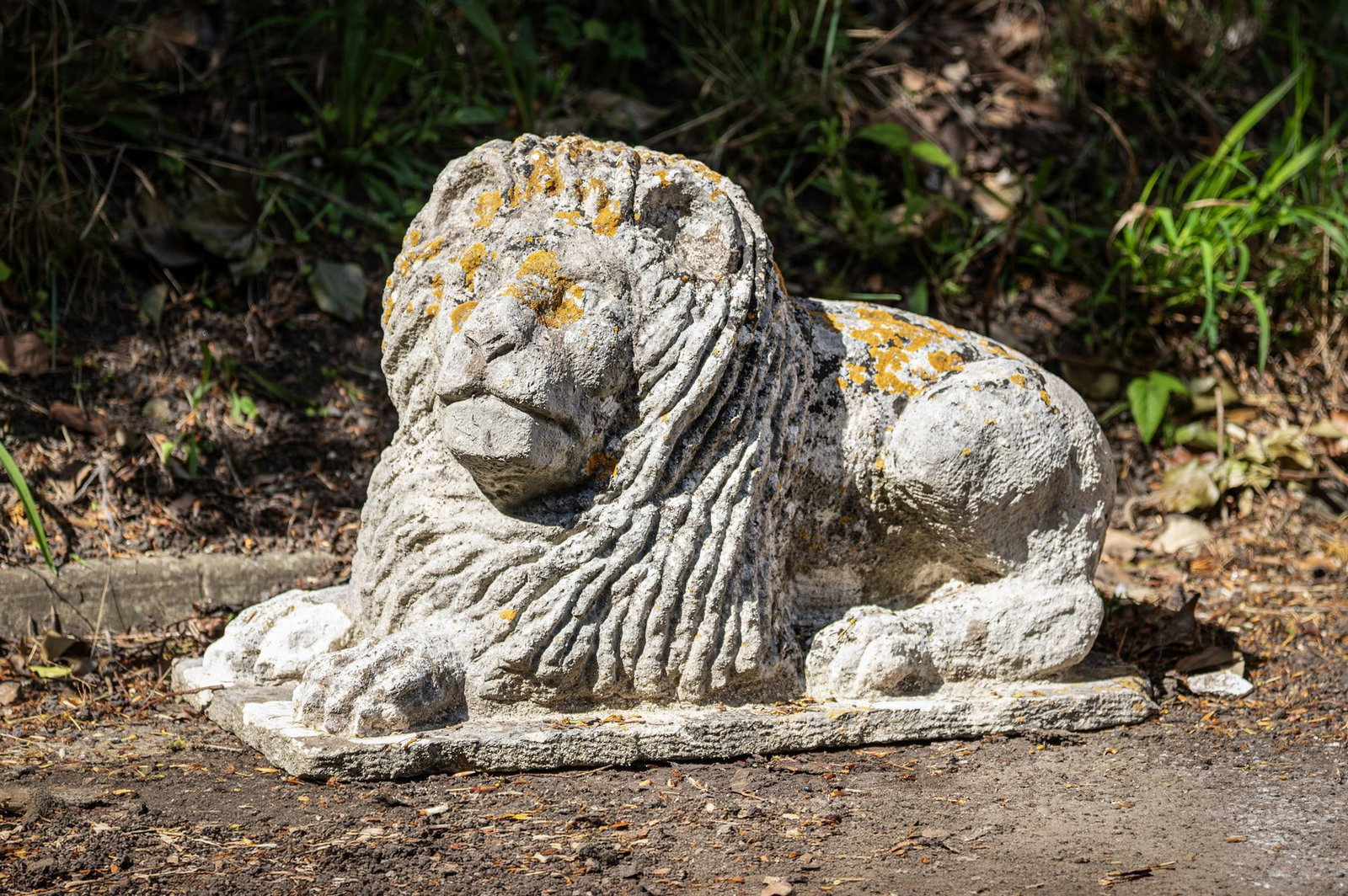 A CARVED LIMESTONE FIGURE OF A LION, PROBABLY 19TH CENTURY (1 of 2)