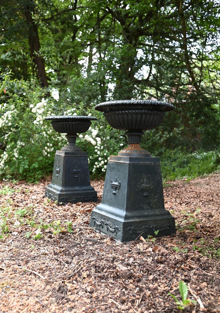 A PAIR OF VICTORIAN PAINTED CAST IRON PLANTERS ON ORIGINAL PEDESTALS, LATE 19TH CENTURY: A PAIR OF VICTORIAN PAINTED CAST IRON PLANTERS ON ORIGINAL PEDESTALS LATE 19TH CENTURY 86cm high overall, the bases 42cm square
