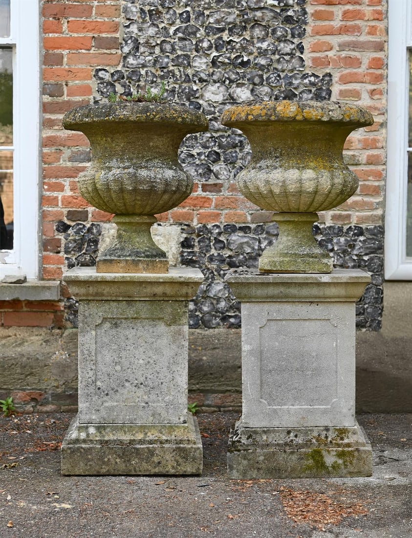 A PAIR OF GEORGE III CARVED COTSWOLD STONE URN PLANTERS, CIRCA 1800 (1 of 1)