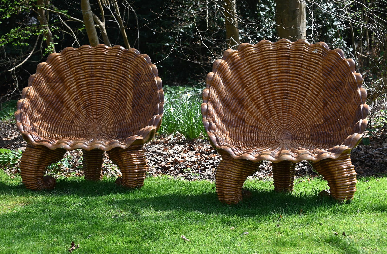 A LARGE PAIR OF CARVED TEAK 'OYSTER SHELL' GROTTO GARDEN SEATS, CONTEMPORARY (1 of 1)