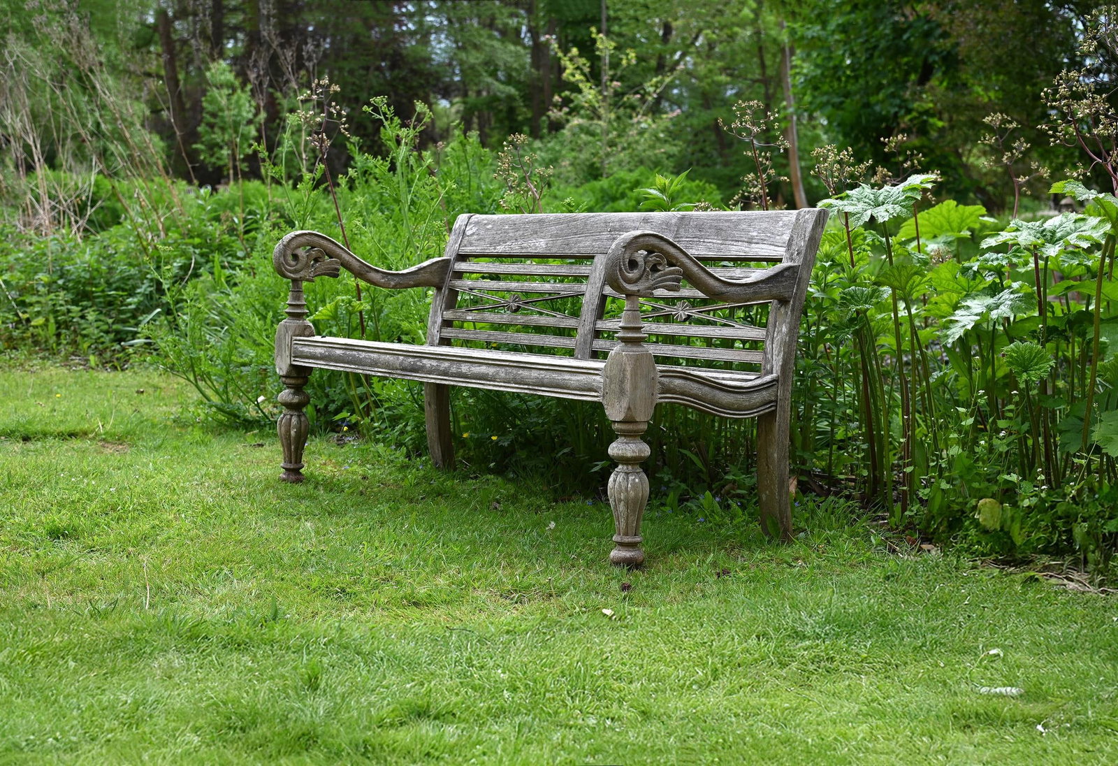 AN INDIAN CARVED HARDWOOD GARDEN BENCH, 20TH CENTURY (1 of 1)
