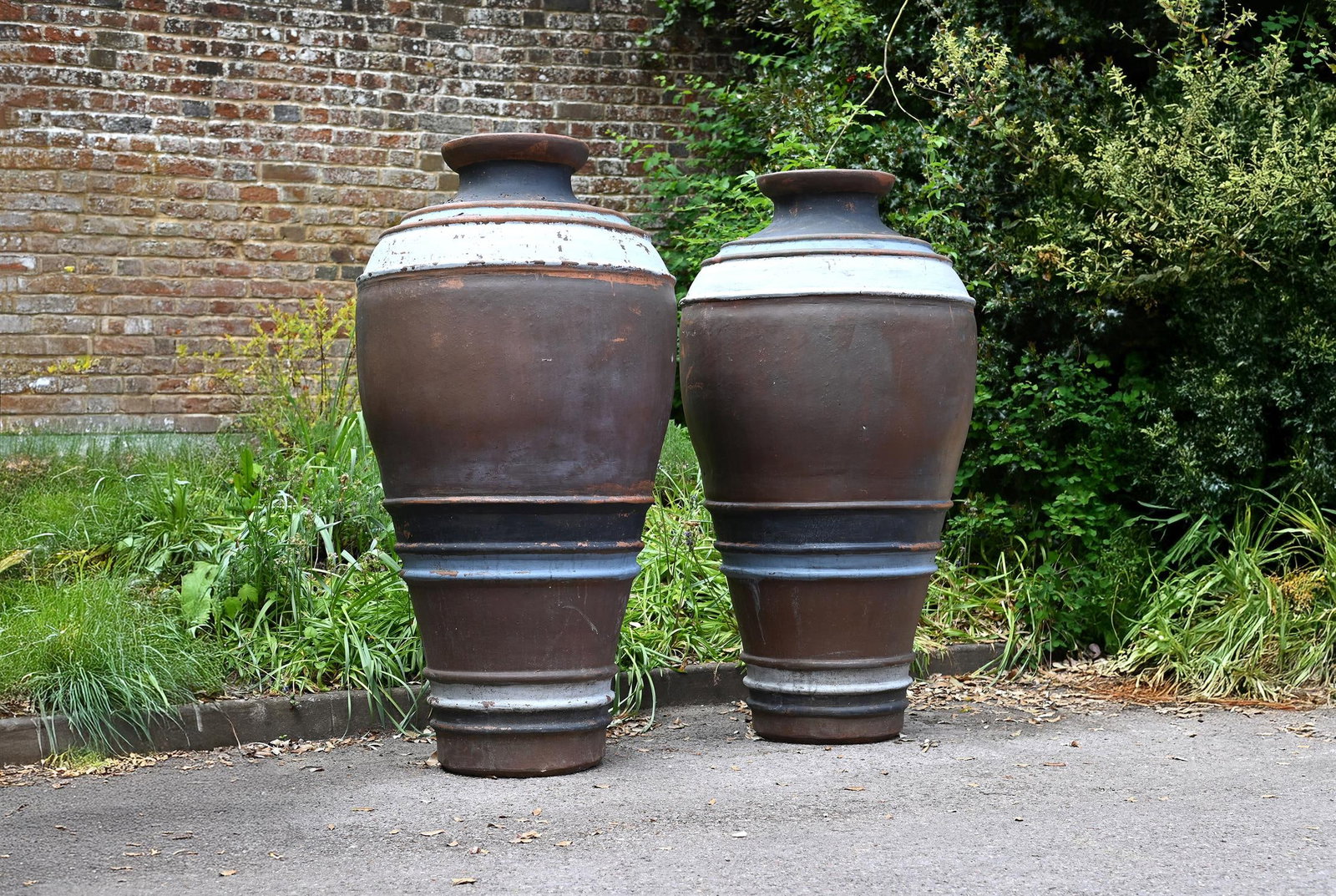 A LARGE PAIR OF POLYCHROME PAINTED TERRACOTTA AMPHORA, 20TH CENTURY (1 of 1)