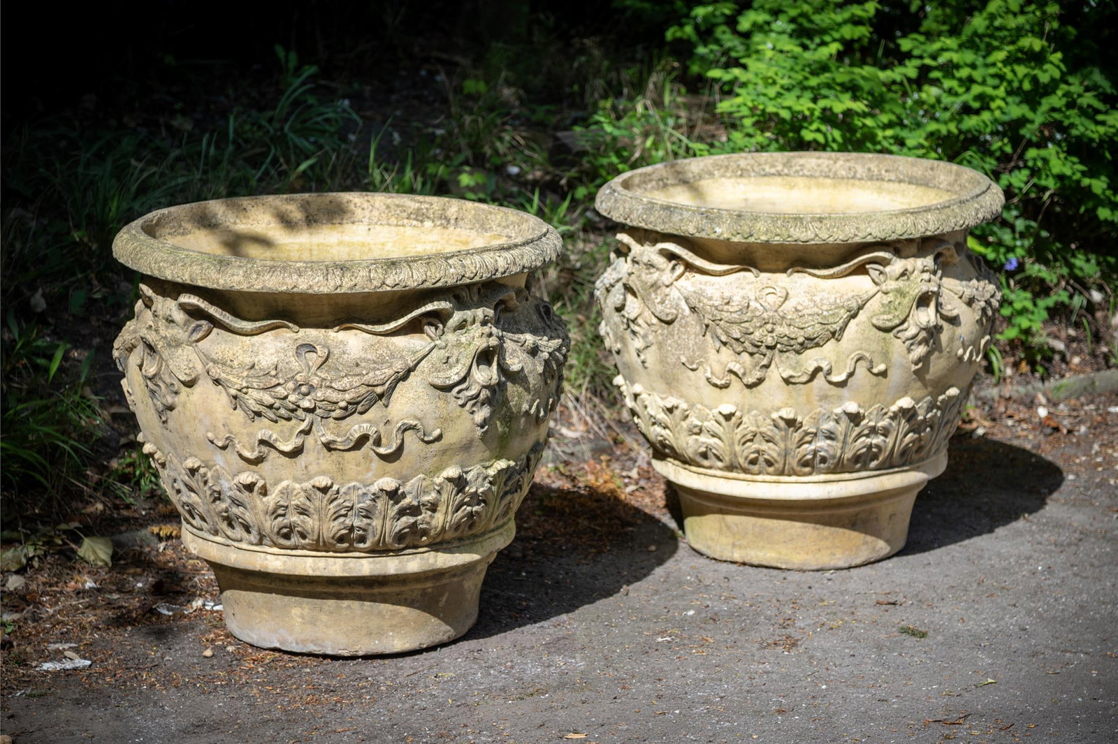 A LARGE PAIR OF TERRACOTTA COLOURED COMPOSITION STONE PLANTERS, POSSIBLY ITALIAN, CONTEMPORARY (1 of 2)