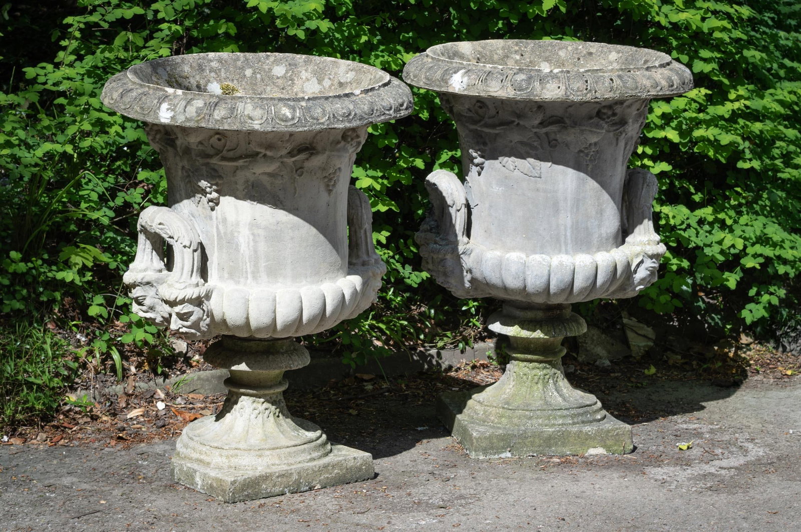 A LARGE PAIR OF COMPOSITION STONE CAMPANA VASES, 20TH CENTURY (1 of 1)