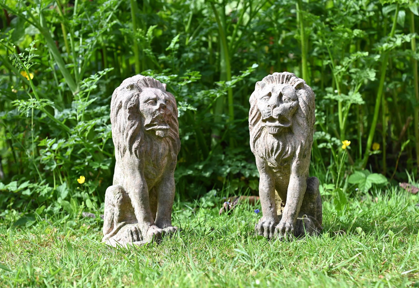 A PAIR OF CARVED VERONA ROSSO LIONS, 20TH CENTURY (1 of 1)