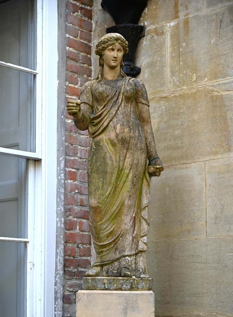 A LARGE TERRACOTTA MYTHOLOGICAL FEMALE FIGURE, POSSIBLY HEBE, MID TO LATE 19TH CENTURY: A LARGE TERRACOTTA MYTHOLOGICAL FEMALE FIGURE, POSSIBLY HEBE ATTRIBUTED TO BLASHFIELD, MID TO LATE 19TH CENTURY Set on a Blashfield pedestal base, stamped the figure 123cm high, the base 90.5cm high, 