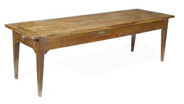 An oak and fruitwood farmhouse table, 19th centur: An oak and fruitwood farmhouse table, 19th century, with two central drawers, square tapered legs, 84cm high, the top 250 x 76cm overall; together with two benches, late 19th century, of trestle form,