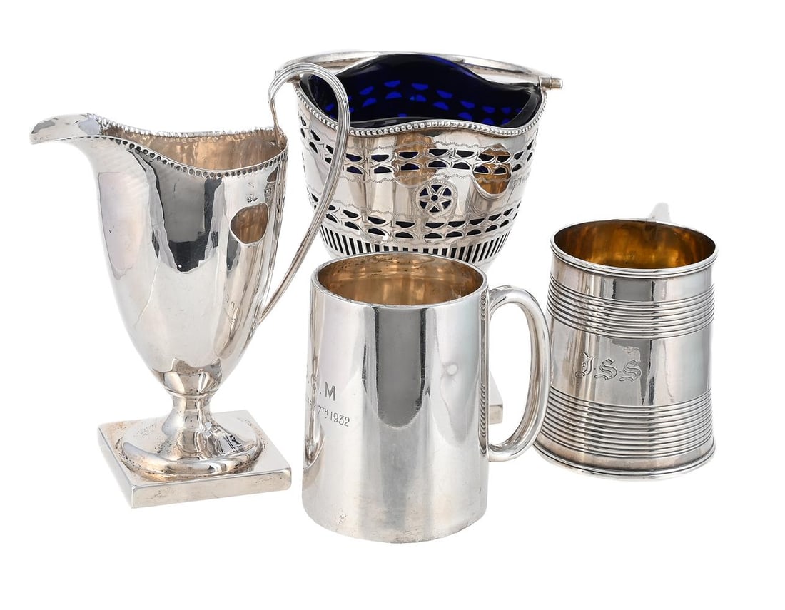 FOUR SILVER ITEMS: A SILVER SWING HANDLED SUGAR BASKET MAPPIN & WEBB, BIRMINGHAM 1926 With a swing loop handle, a beaded border, pierced bands and on a square pedestal foot 16cm high With a blue glass liner