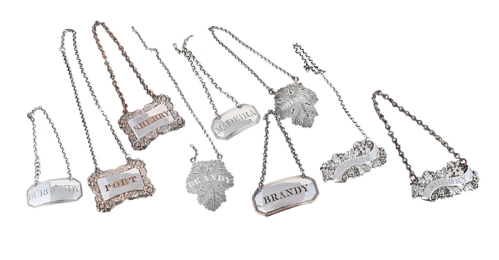 SIX SILVER DECANTER LABLES AND THREE SILVER ON COPPER EXAMPLES: A PAIR OF VICTORIAN SILVER DECANTER LABELS