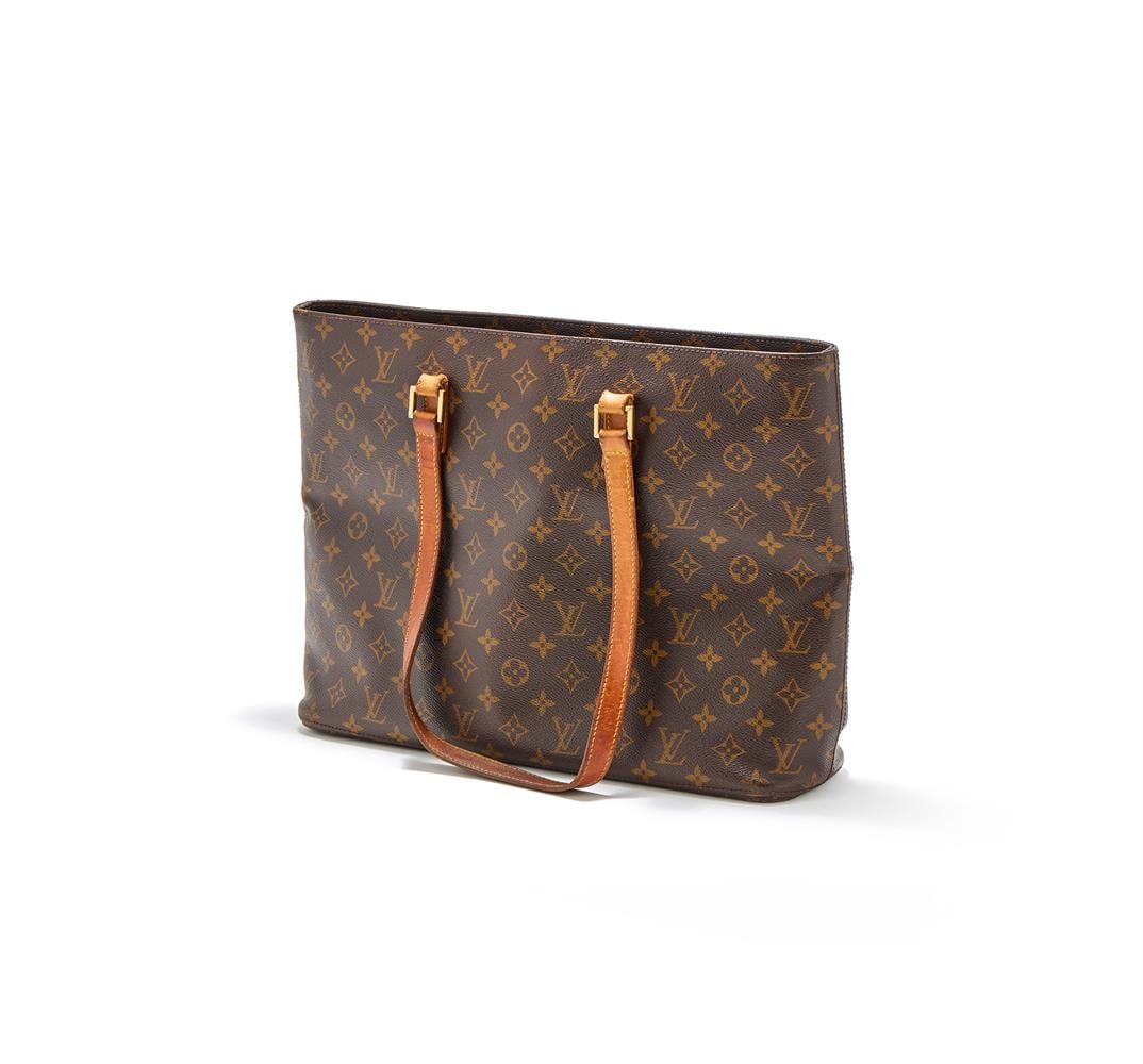LOUIS VUITTON, MONOGRAM, LUCO, A COATED CANVAS TOTE BAG: LOUIS VUITTON, MONOGRAM, LUCO A COATED CANVAS TOTE BAG With twin leather loop handles, the zip fastener opening to a suede interior with a zipped pocket and four open pockets Accessories: None